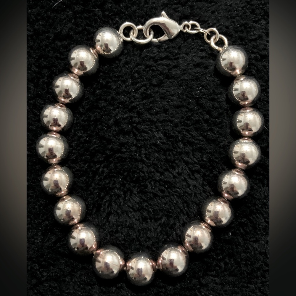 New, in box, 8” bracelet